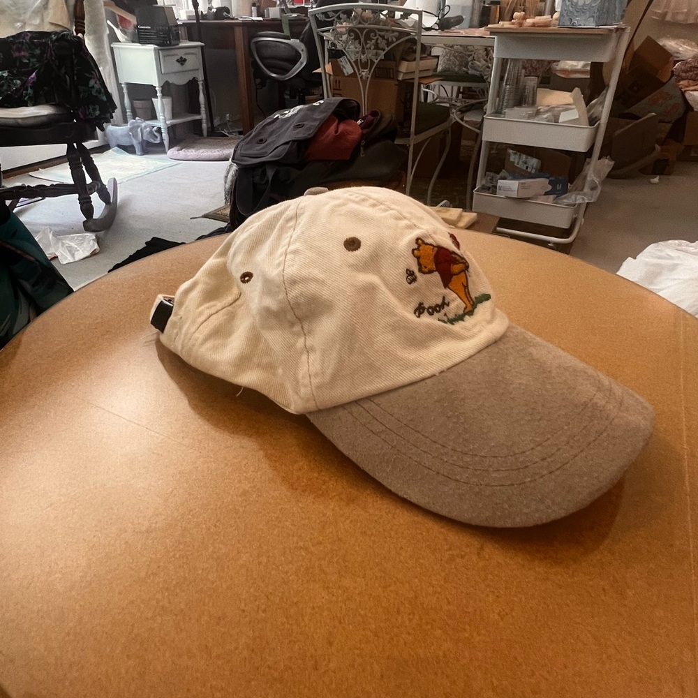 25% off listed price. Vintage (26 years)Adult size Winnie the Pooh baseball cap.